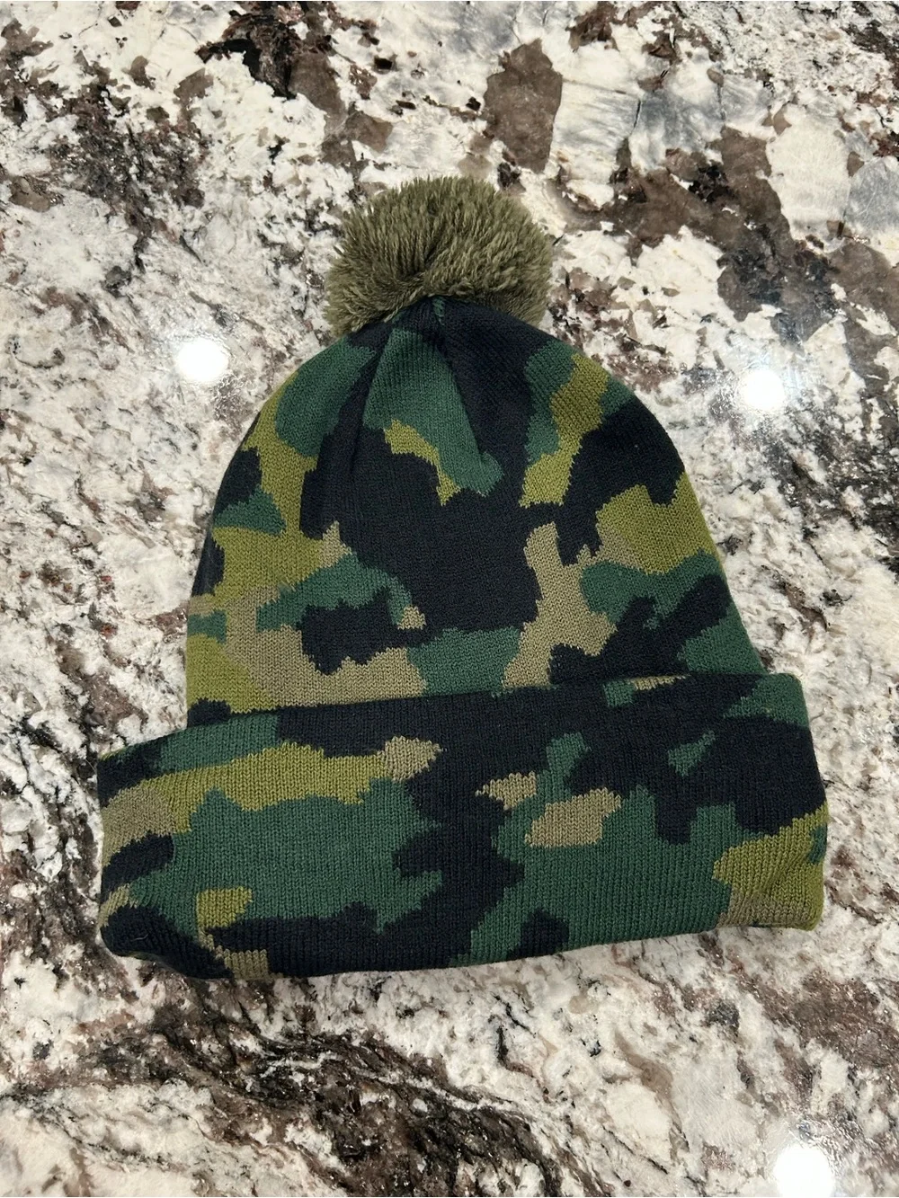 Nike Kids Camo Pom Beanie in Green, Black with Orange Logo